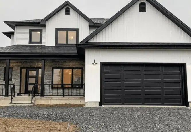 Black Garage Doors on White House Exteriors